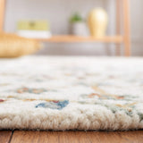 SAFAVIEH Handmade Heritage Snjolaug Floral Wool Rug